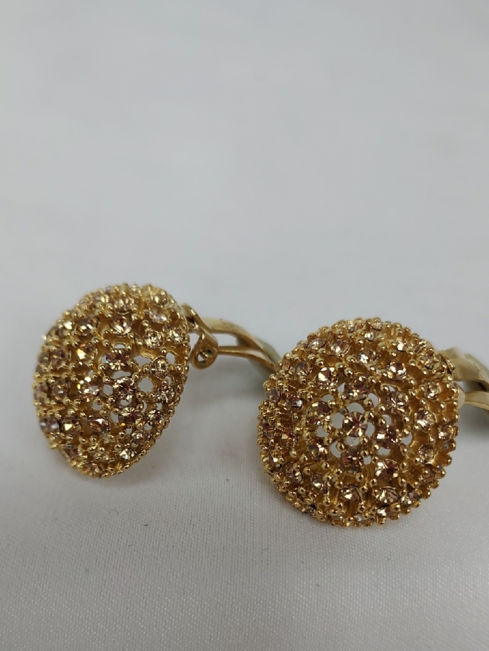 Ciner Gold Tone Textured Pave Rhinestone Dome Clip On Earrings